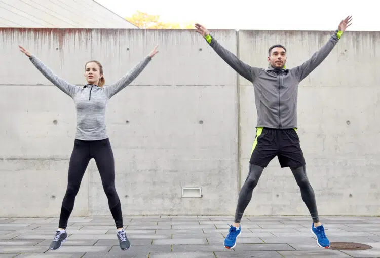 Person doing a 5-minute morning exercise routine at home